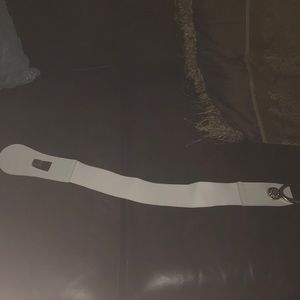 White spandex belt with silver embellishments